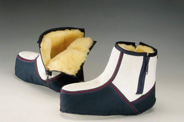 Christ Lammfellschuhe Wärmetherapie