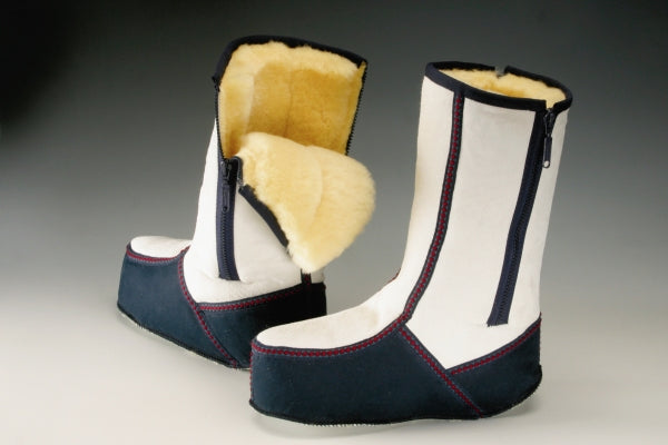 Christ Lammfellstiefel Wärmetherapie